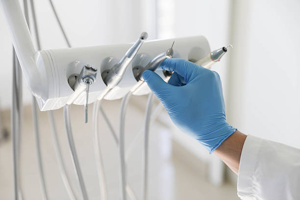Professional Tooth Extraction technician working in Ellicott City, MD